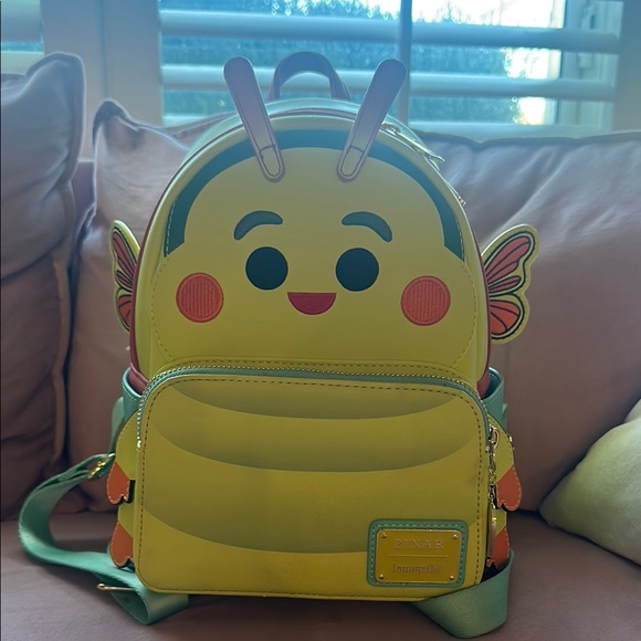 Disney Handbags - Disney RARE Loungefly Bugs Life catipillar Backpack